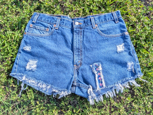 Levi's 505 Distressed Cutoff Denim Shorts with Floral Patch