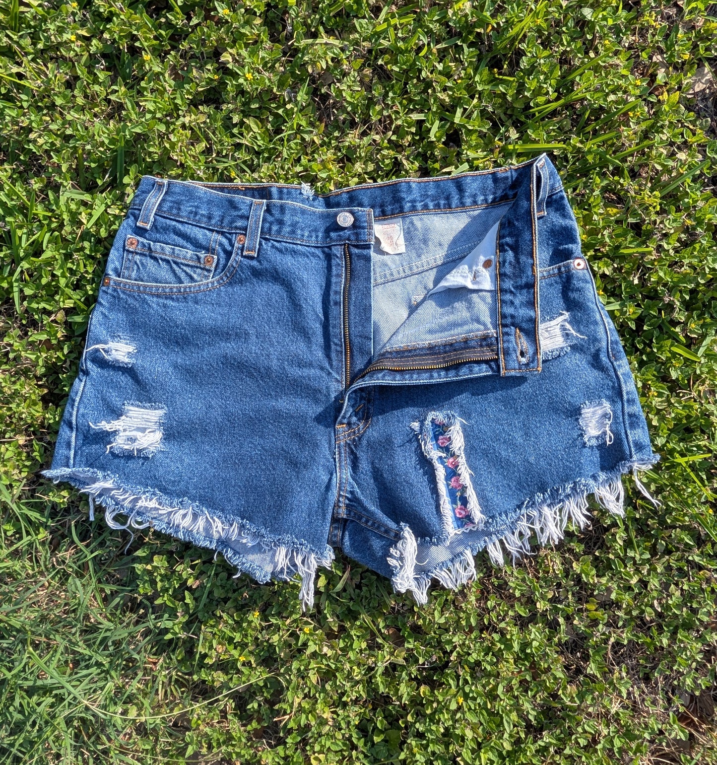 Levi's 505 Distressed Cutoff Denim Shorts with Floral Patch